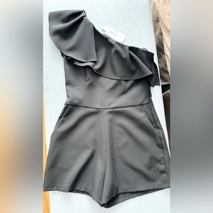 Aqua one shoulder romper. Brand new with tags.